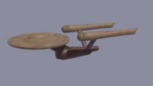 Raumschiff Enterprise mit Holzoberfläche
